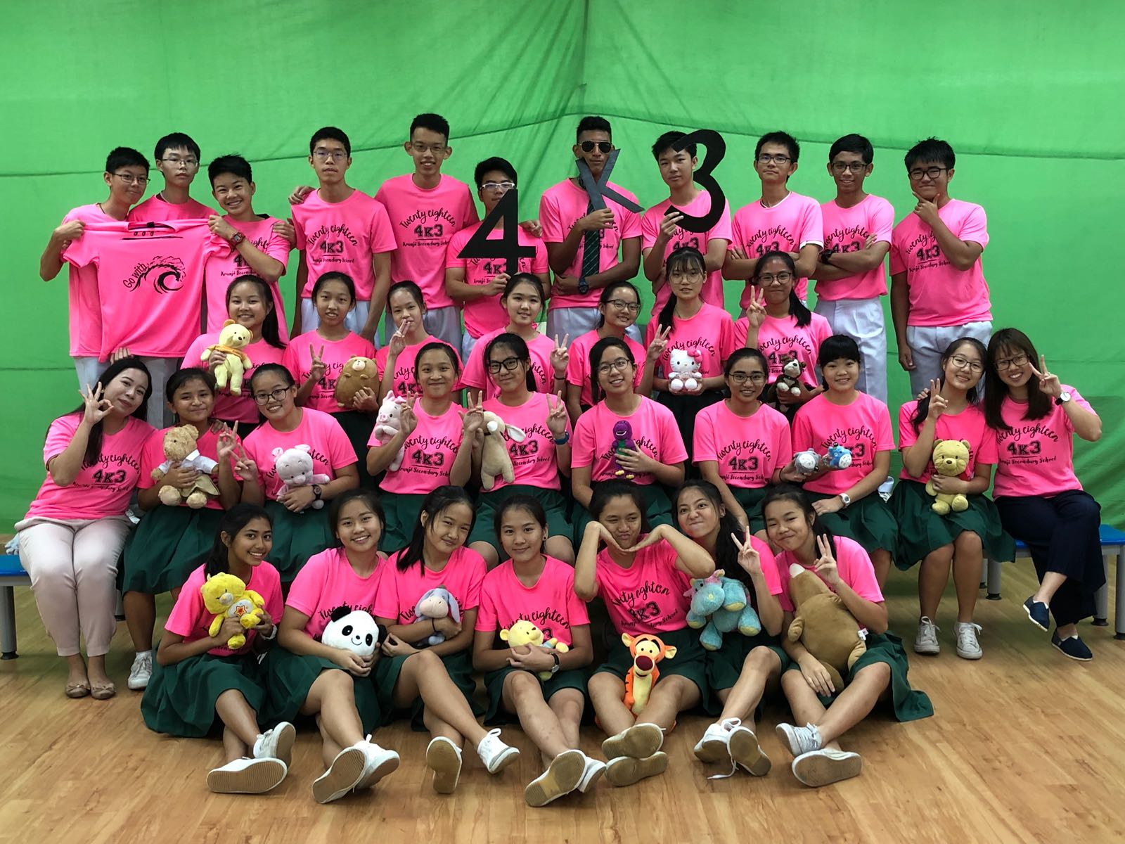 Group Class Photo in Neon Pink T-Shirt