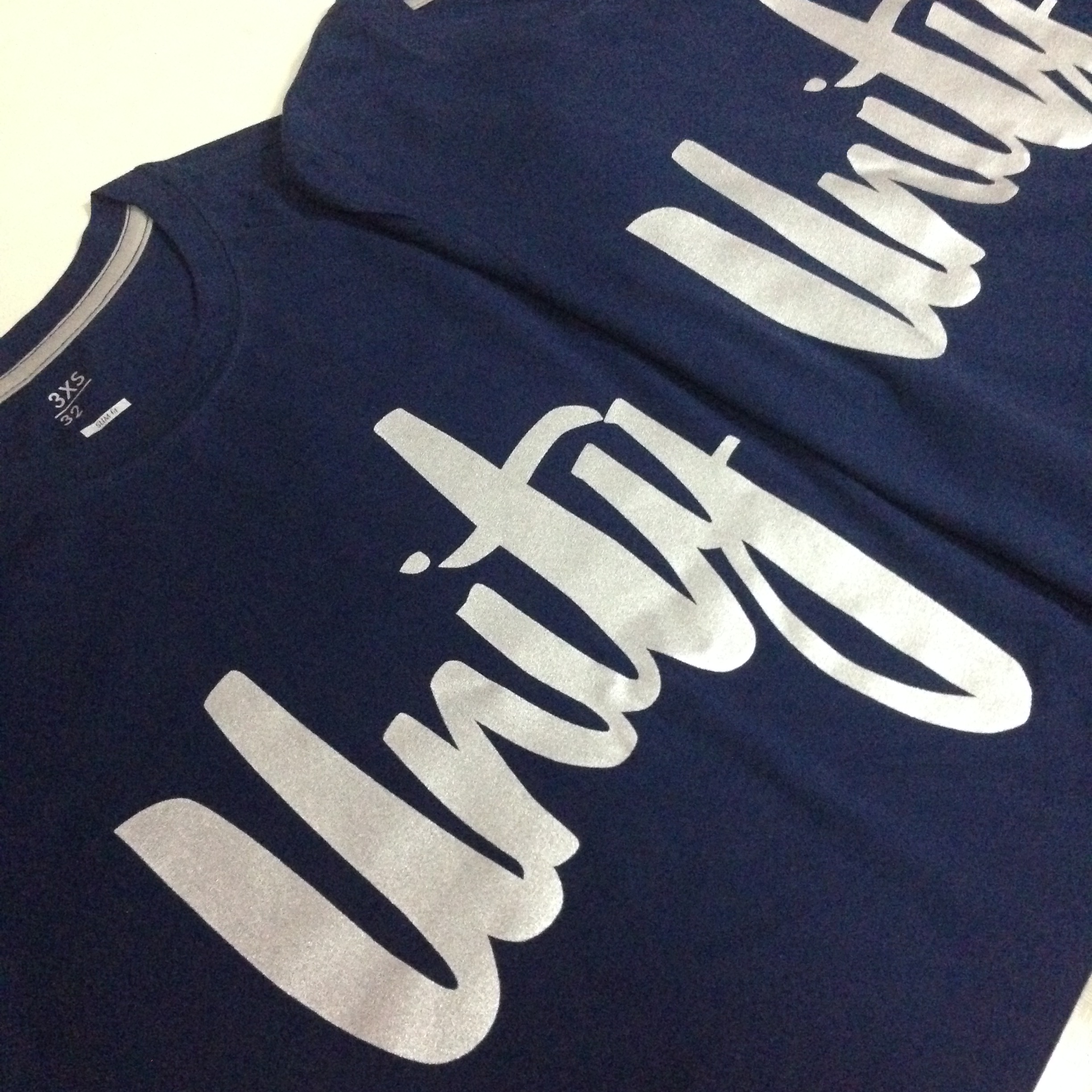 Silver Silkscreen Printing on Navy T-Shirt