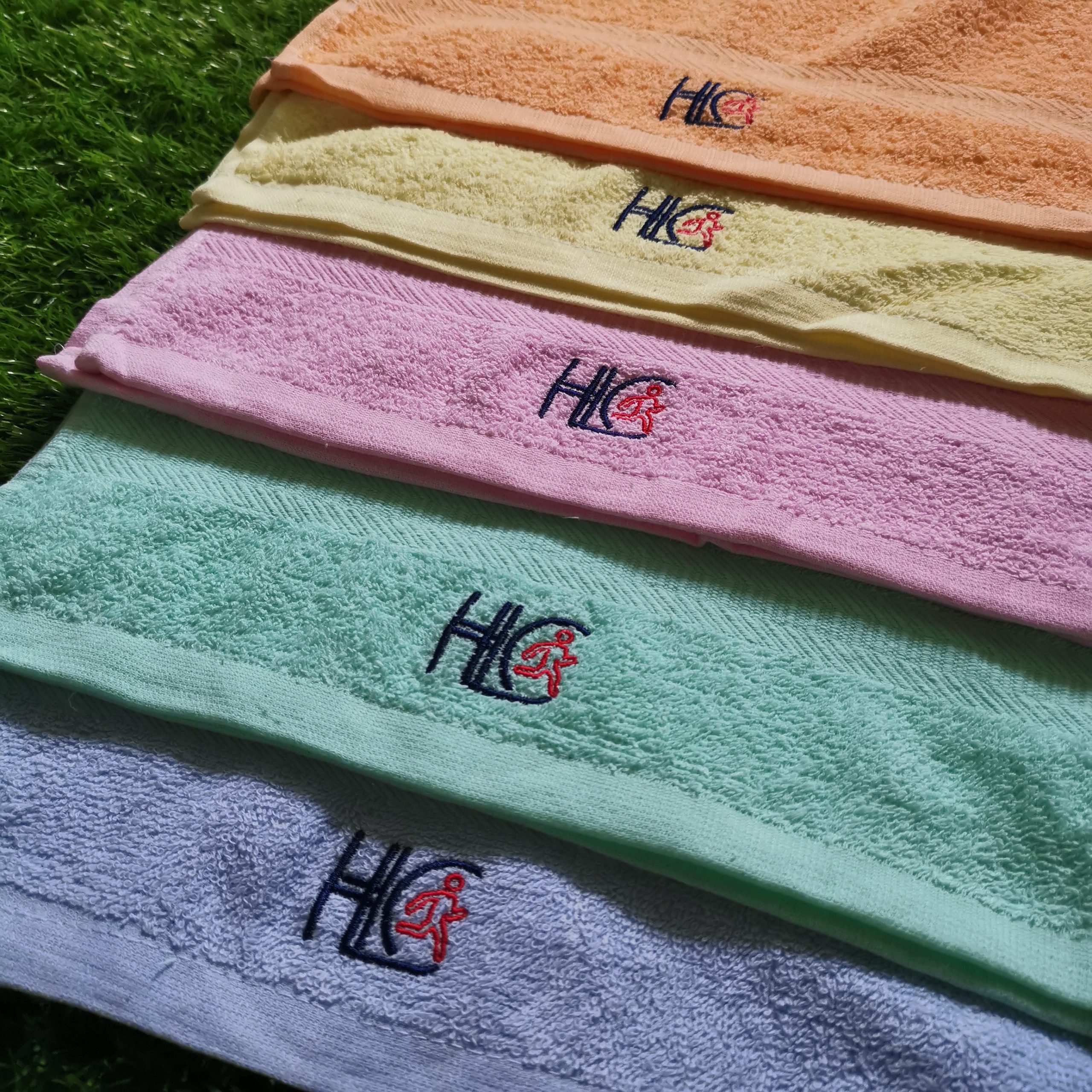 Embroidery logo on different coloured Towels